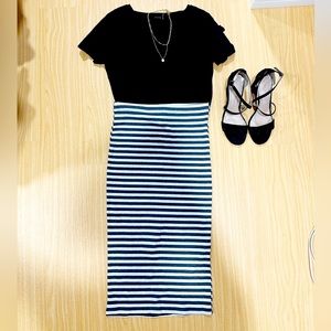 Forever 21 gray and white stripped midi skirt in size Medium. New with tags.